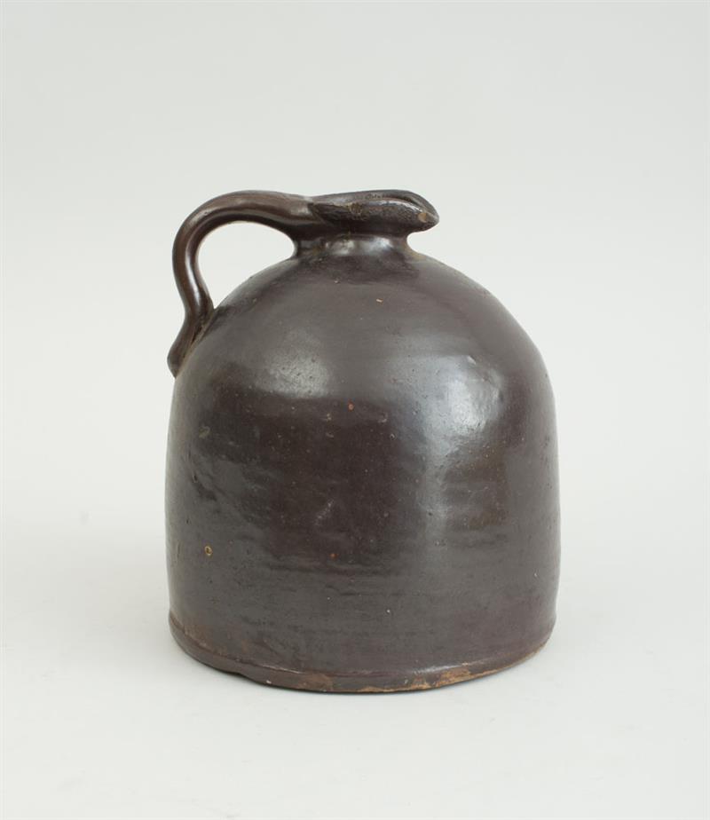 Appraisal: BROWN GLAZED STONEWARE JUG in Estimate -