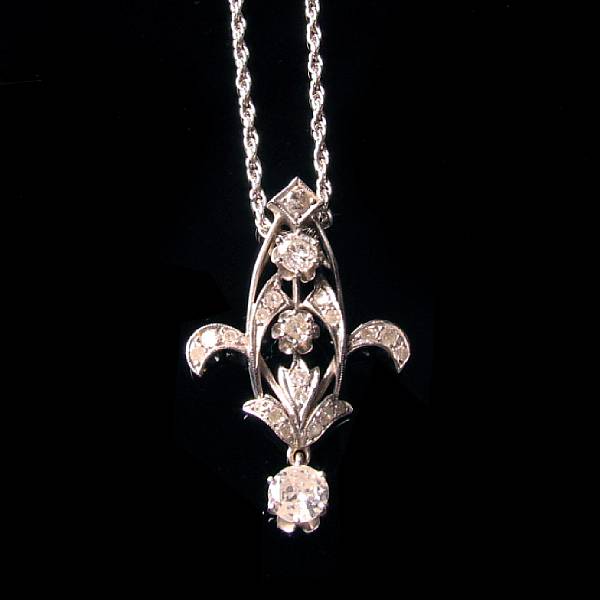 Appraisal: A diamond and white gold pendant with chain estimated total