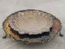 Appraisal: A silver plated salver with cast border and central engraving