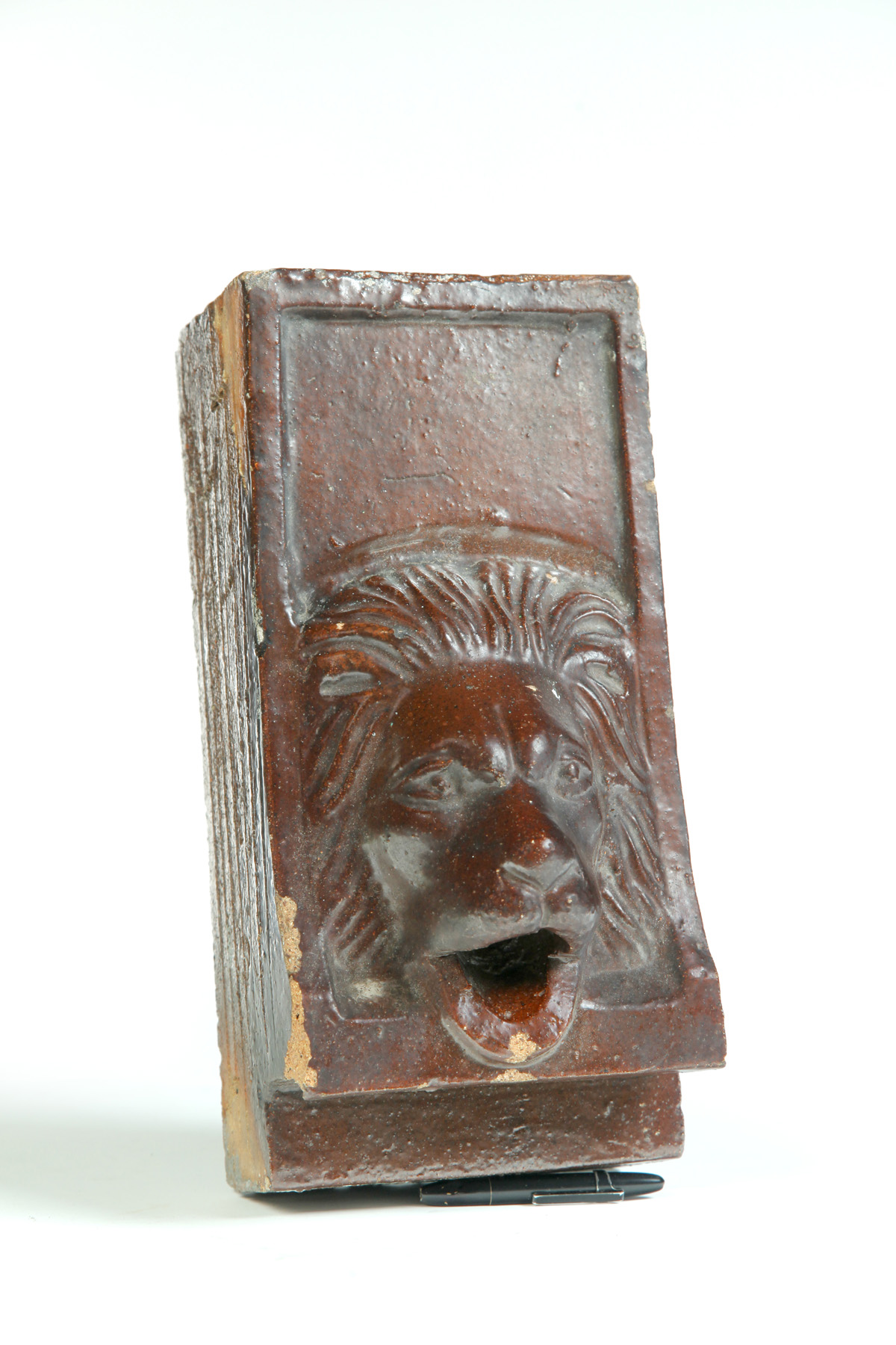 Appraisal: AMERICAN SEWERTILE DOWNSPOUT Twentieth century Molded lion head Chips h