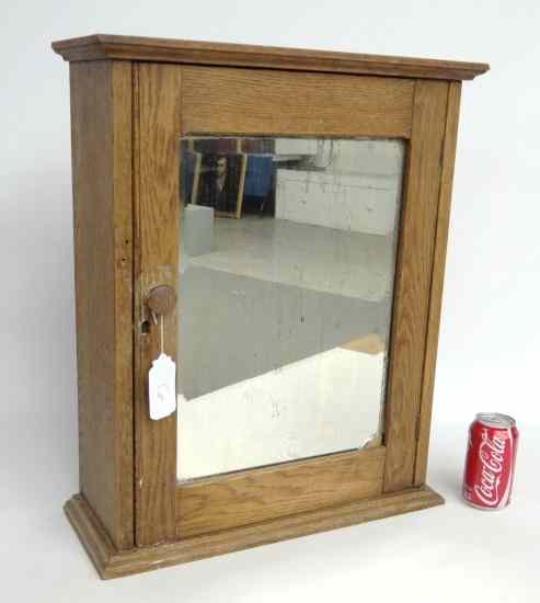 Appraisal: C ' s oak beveled mirrored door medicine cabinet ''