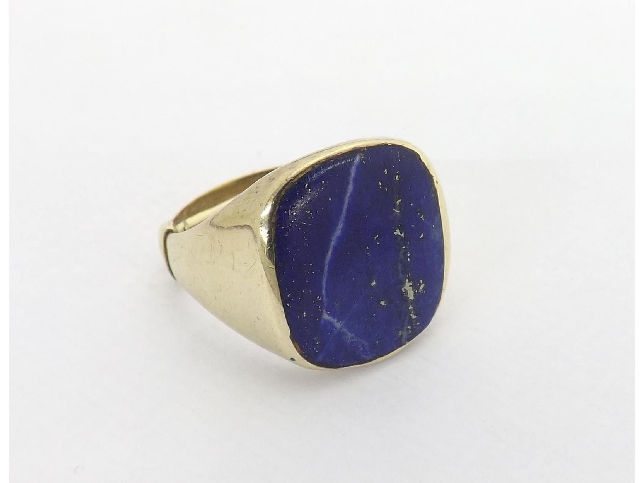 Appraisal: Lapis lazuli gold mounted signet ring stamped k with internal