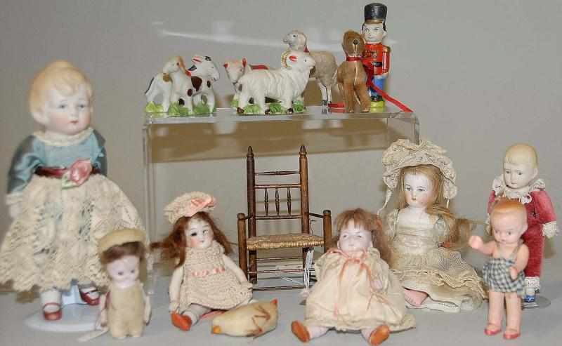 Appraisal: Assorted Small Doll Accessories Figurines Lot of small dolls bisque