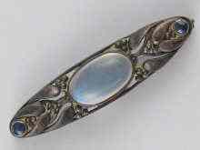 Appraisal: An Arts and Crafts silver bar brooch set with a