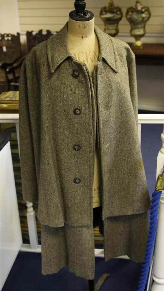 Appraisal: A Harrods scotch tweed gentlemans travelling cape coat Estimate -