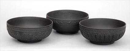 Appraisal: THREE WEDGWOOD BLACK BASALT BOWLS Variously banded with acanthus leaves