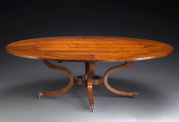 Appraisal: A Regency style concentric expanding mahogany dining table The circular