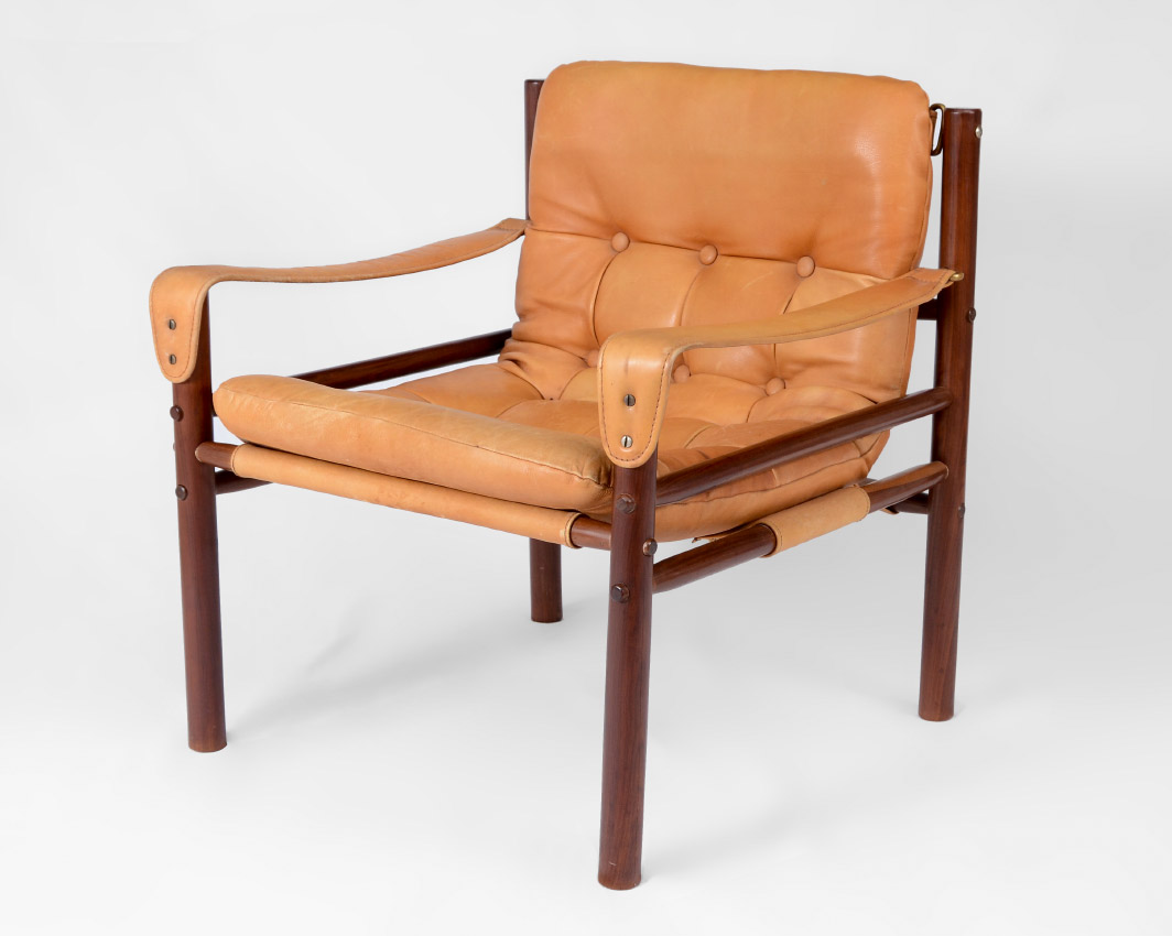 Appraisal: ROSEWOOD DANISH SAFARI CHAIR Rosewood frame with tacked tan leather