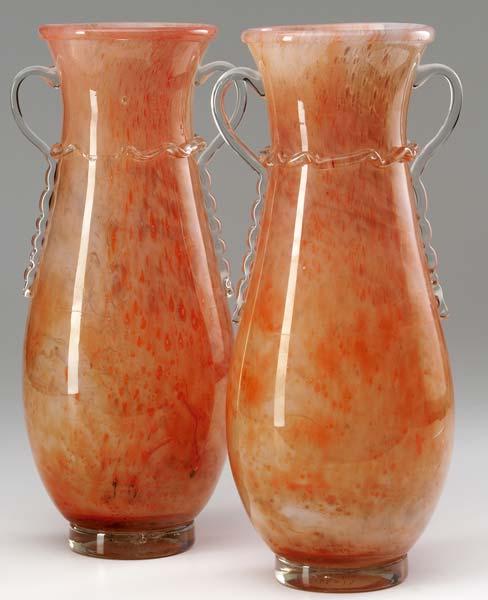 Appraisal: DURAND Pair of orange Cluthra glass two-handled vases with clear