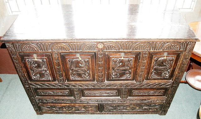 Appraisal: Victorian oak mule chestwith carved panel front cm