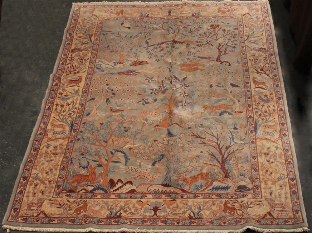 Appraisal: TABRIZ RUG primarily blue and cream with wild animals amidst