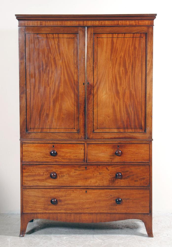 Appraisal: A GEORGE III MAHOGANY LINEN PRESS early th century the