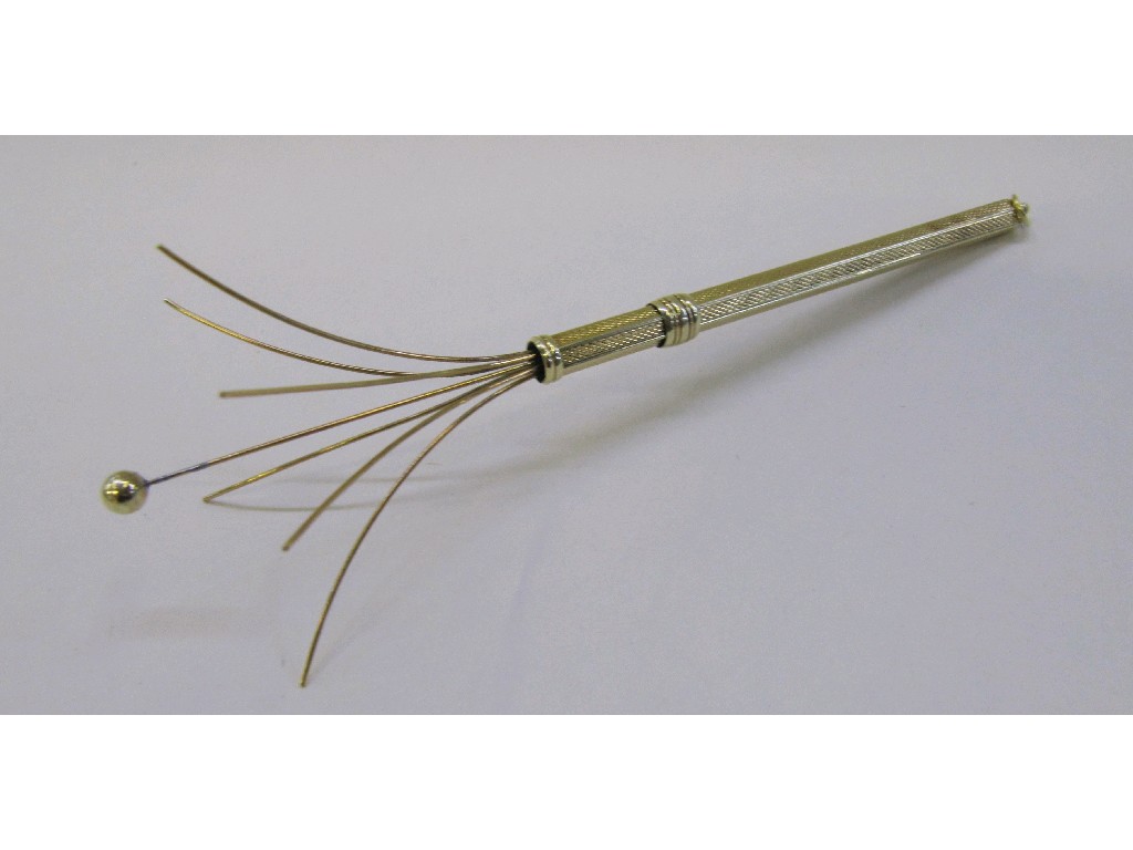 Appraisal: s ct gold cocktail swizzle stick with engine turned decoration