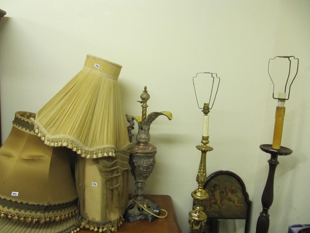 Appraisal: Two floor lamps and a table lamp with shades and