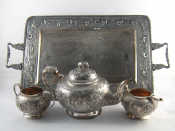 Appraisal: An Indian three piece silver teaset and tray the teapot