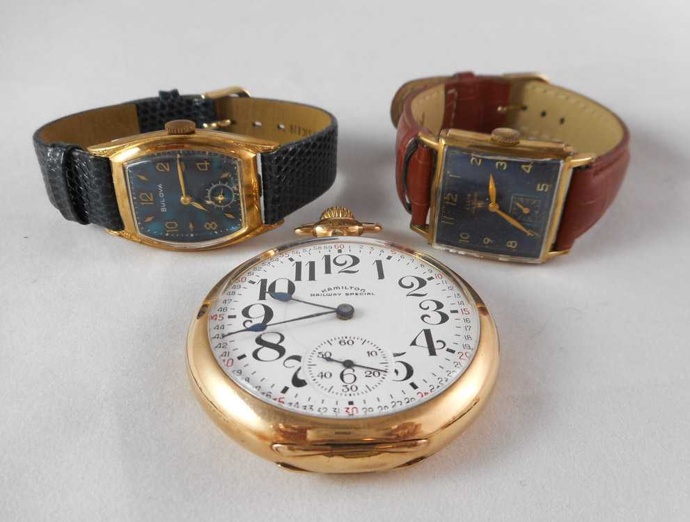 Appraisal: THREE COLLECTIBLE WATCHES the first a open face pocket watch