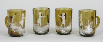 Appraisal: A Set of Four Mary Gregory Glasses with Handles A