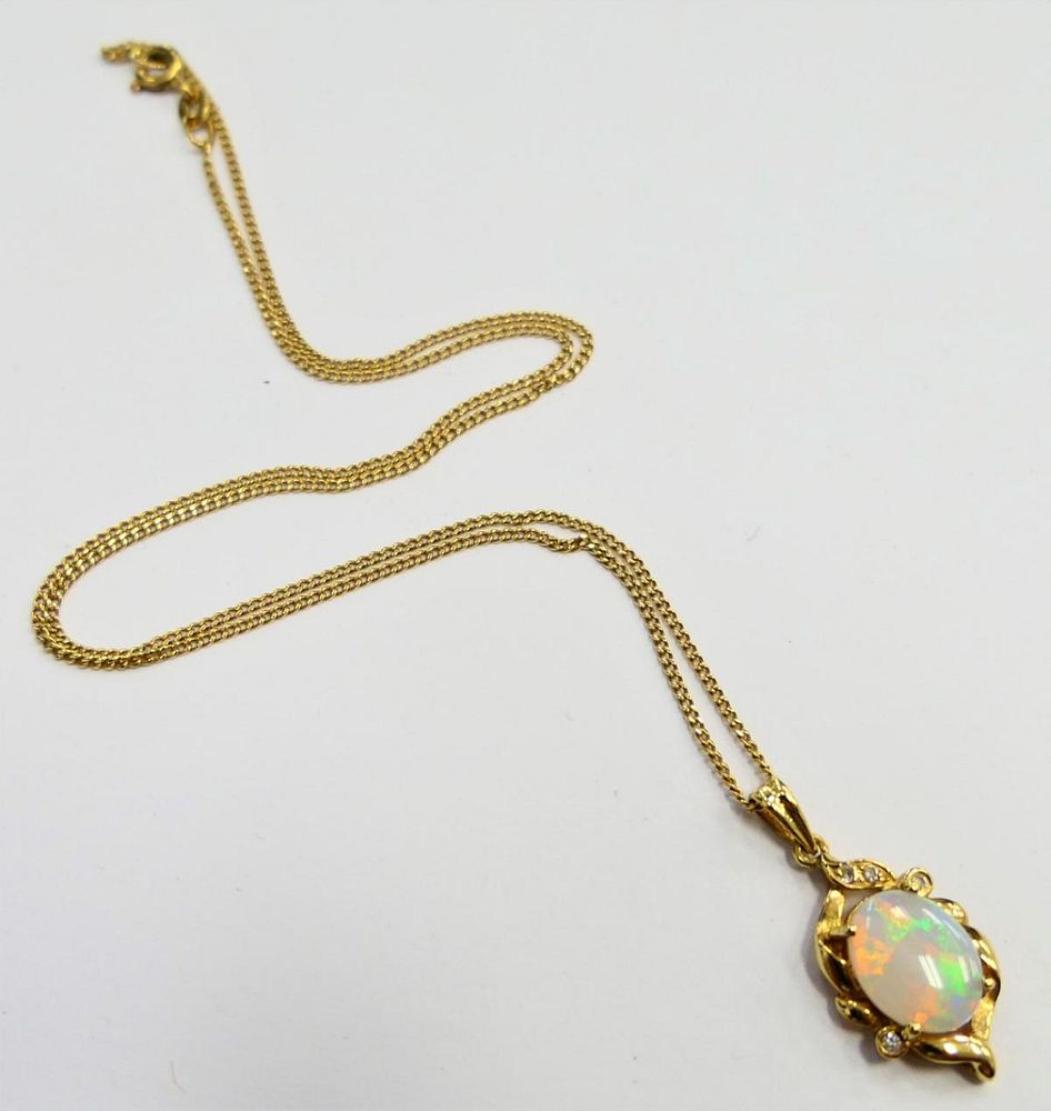 Appraisal: KT Y GOLD OPAL DIAMOND NECKLACE PENDANT Chain measures long