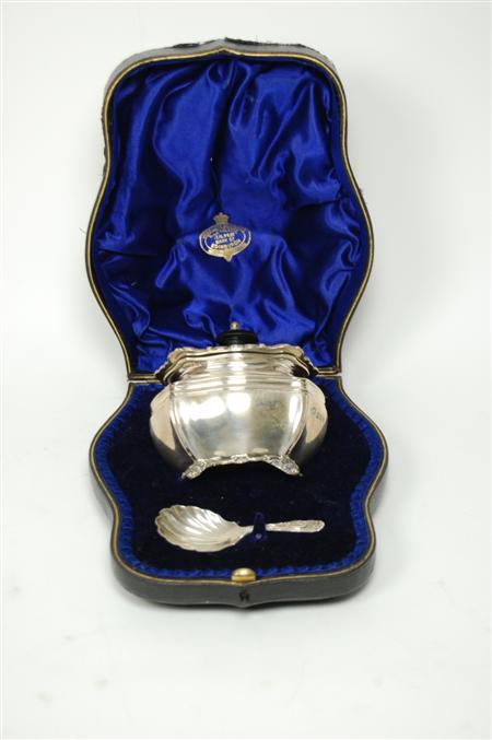 Appraisal: An Edwardian cased tea caddy and caddy spoon by D