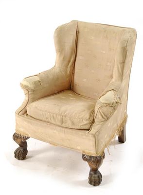 Appraisal: A child's wing armchair in George II style with carved