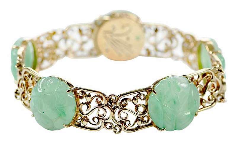 Appraisal: kt Carved Hardstone Bracelet five round carved green hardstone plaques