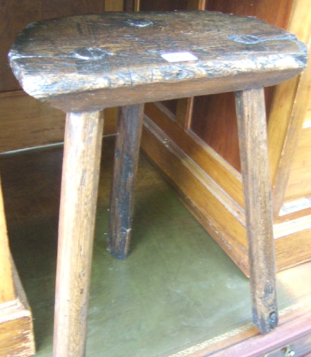 Appraisal: An th century elm and ash three leg stool of