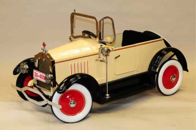 Appraisal: AMERICAN NATIONAL CADILLAC PEDAL CAR Pressed steel classy cream and