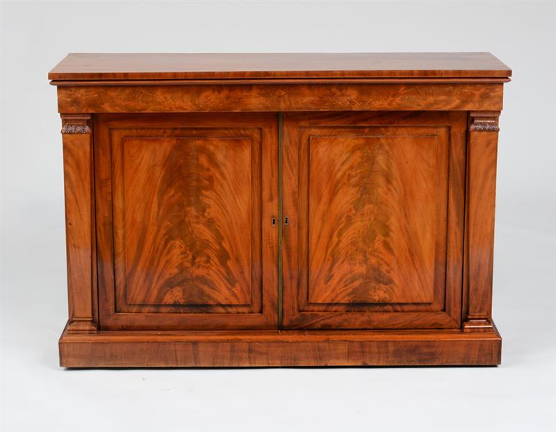 Appraisal: EMPIRE MAHOGANY SIDE CABINET With two doors opening to reveal