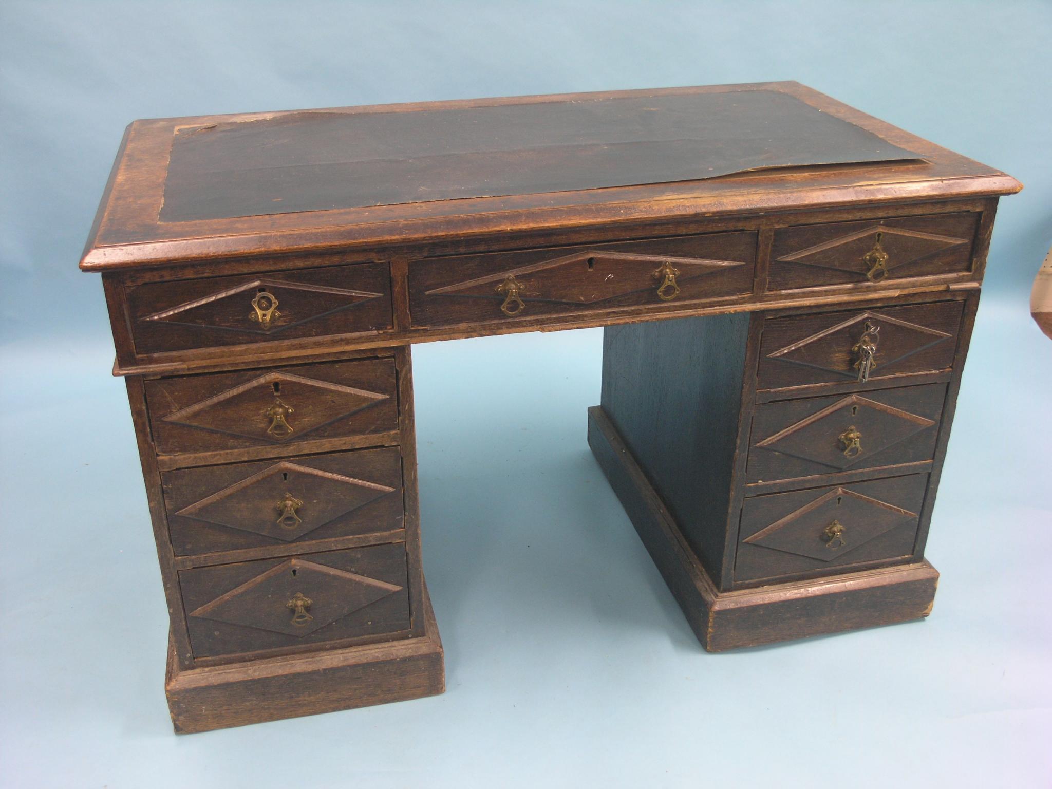 Appraisal: A Victorian dark oak pedestal desk top with three drawers