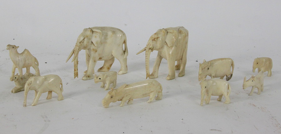 Appraisal: A group of small ivory figures of animals including hippo