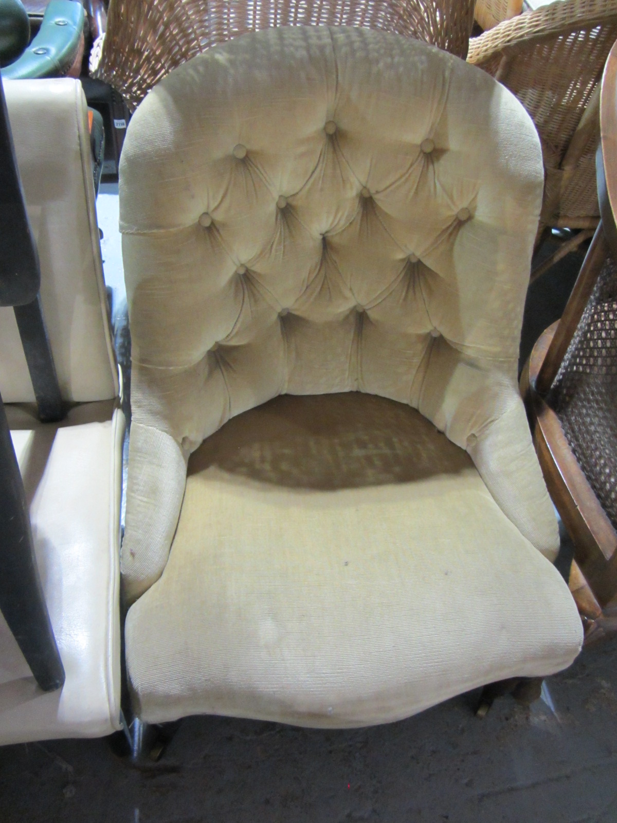 Appraisal: A th century button back nursing chair with turned mahogany