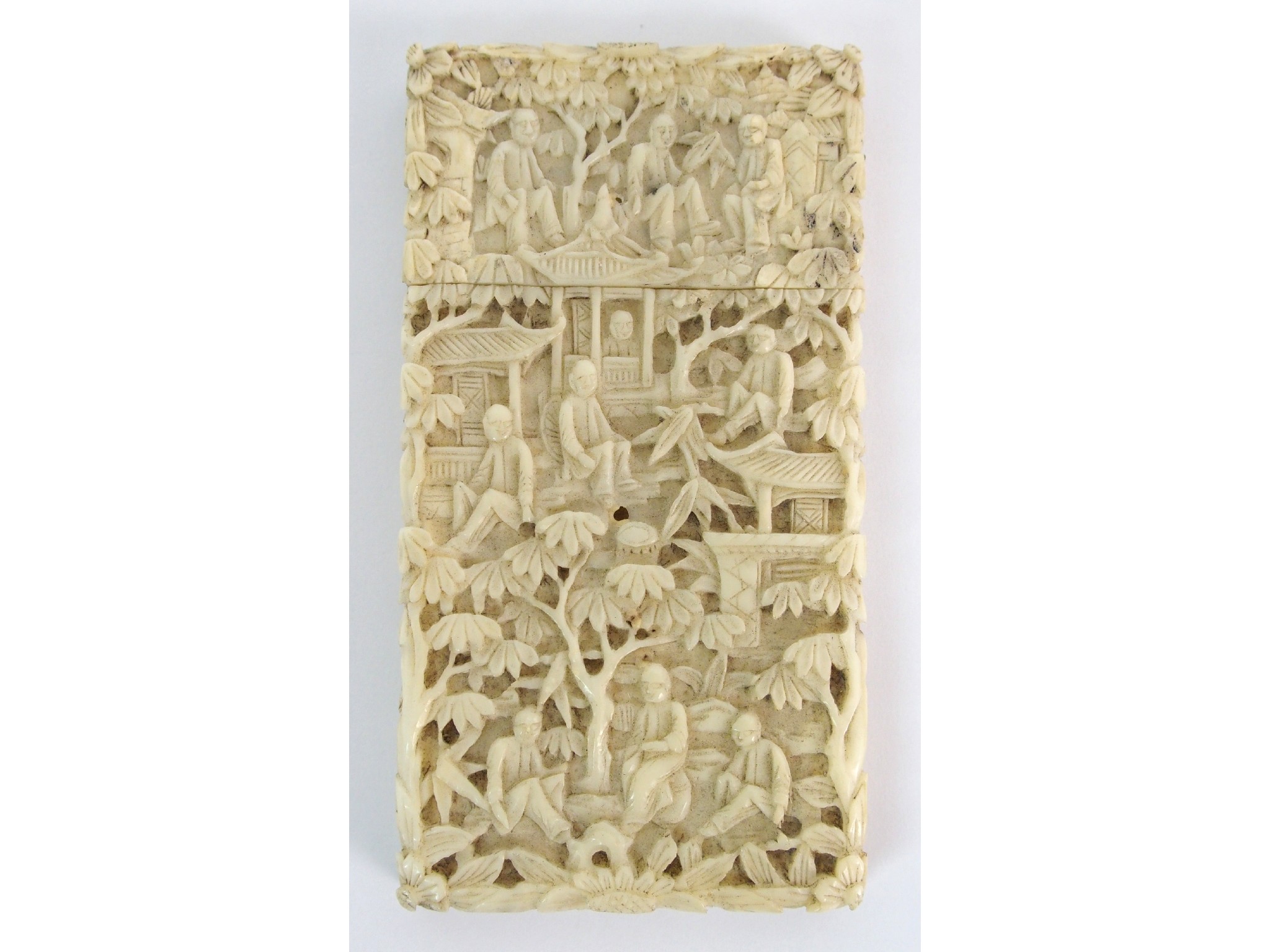 Appraisal: A Cantonese export carved ivory card casedecorated with numerous figures