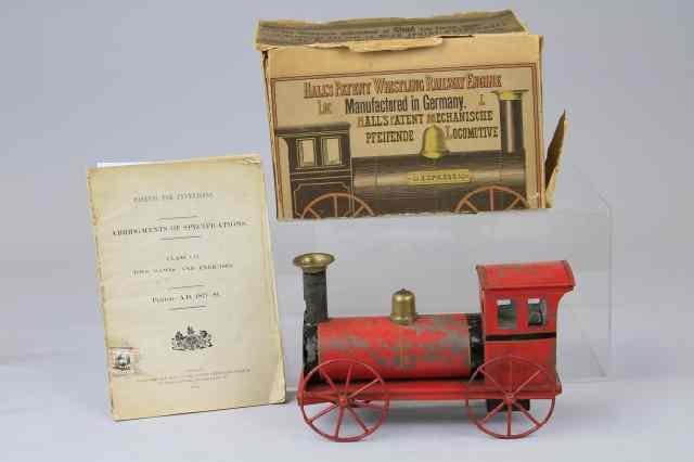 Appraisal: HALLS WHISTLING RAILWAY ENGINE Boxed example England late 's tin