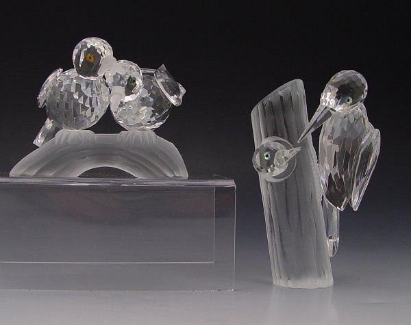 Appraisal: SWAROVSKI CRYSTAL DOVE WOODPECKER FIGURINES pieces to include SCS annual