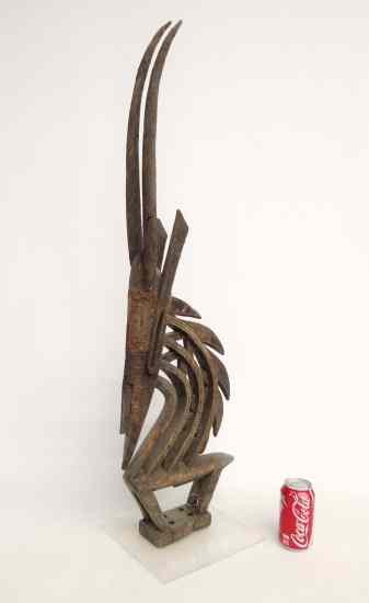 Appraisal: Carved African wooden sculpture of an antelope '' Ht