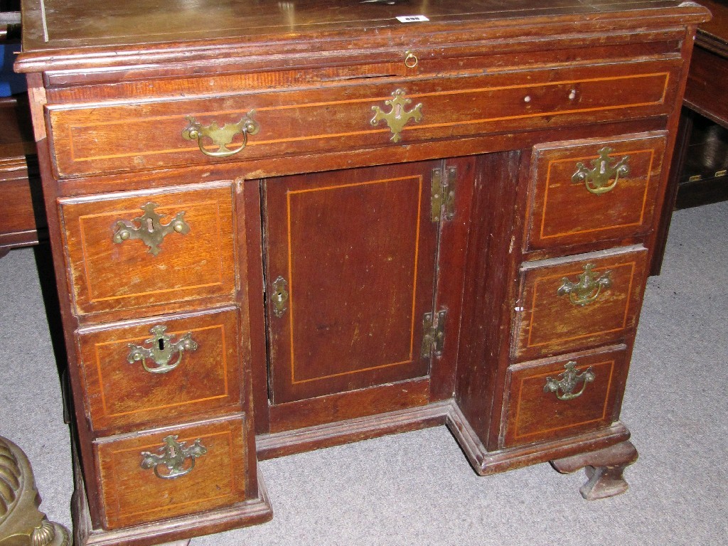 Appraisal: Georgian mahogany and string inlaid kneehole desk