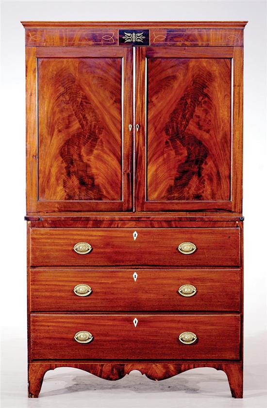 Appraisal: George III inlaid mahogany linen press circa molded cornice over