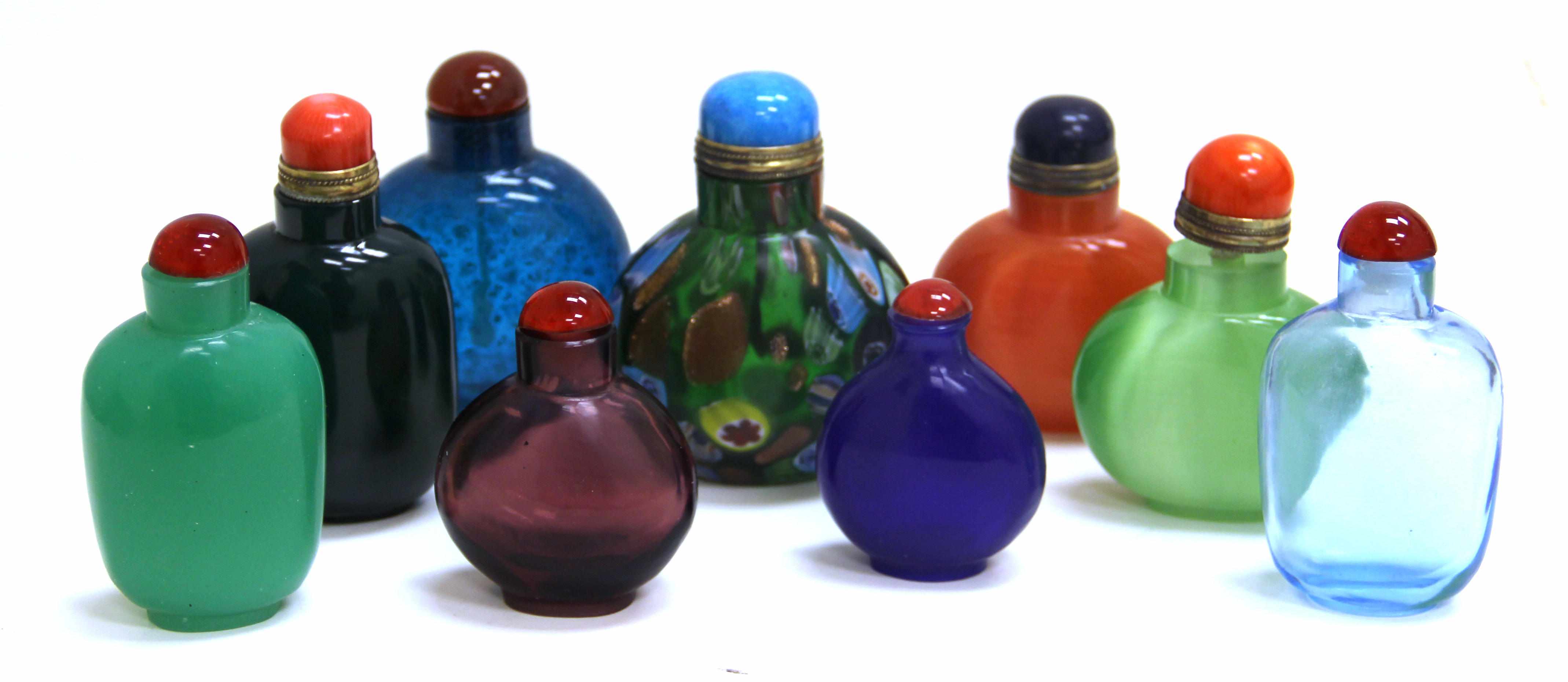 Appraisal: A group of eight glass snuff bottles Of flattened ovoid