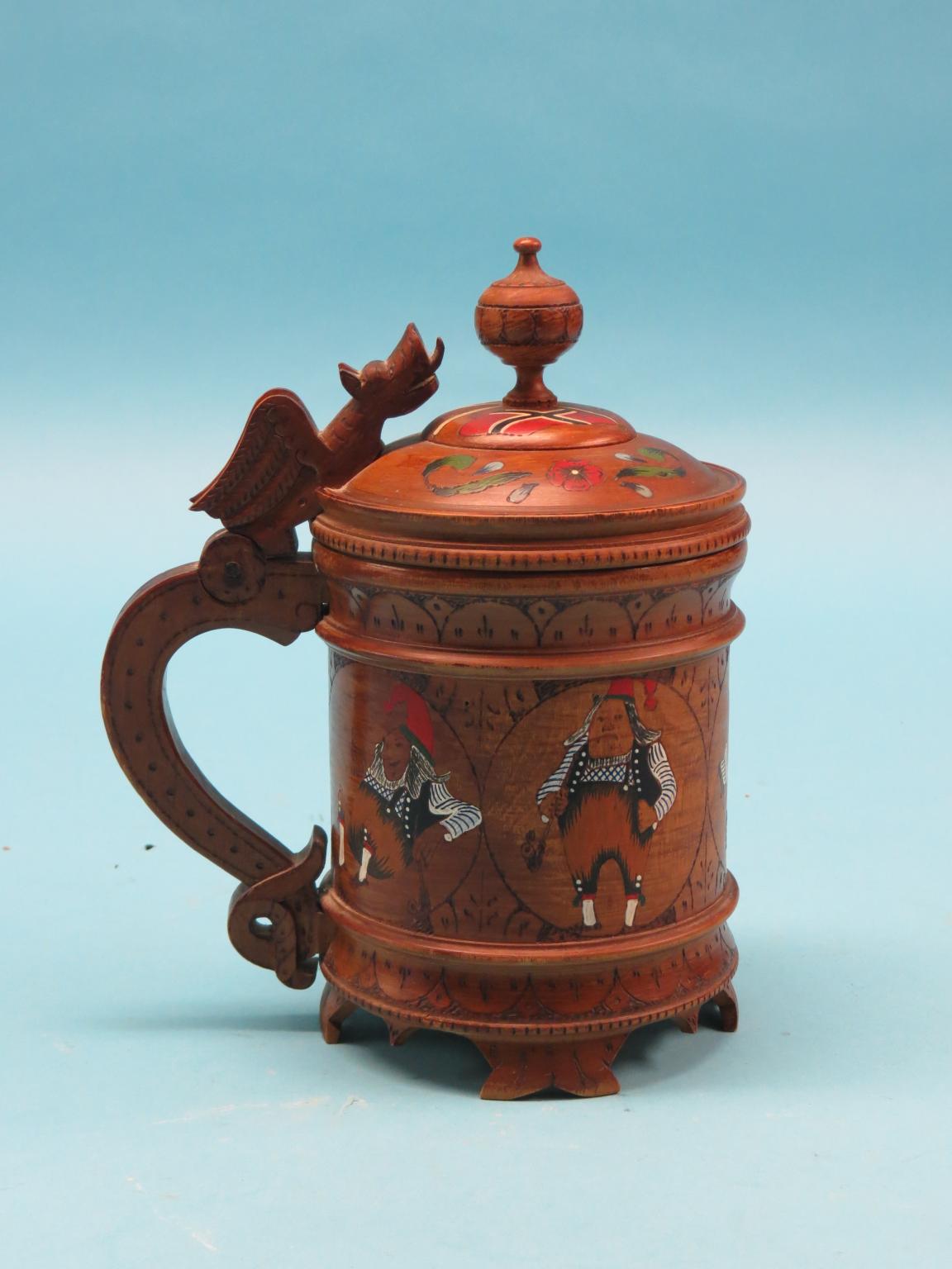 Appraisal: A reproduction Norwegian peg tankard cylindrical-shape painted with figures at