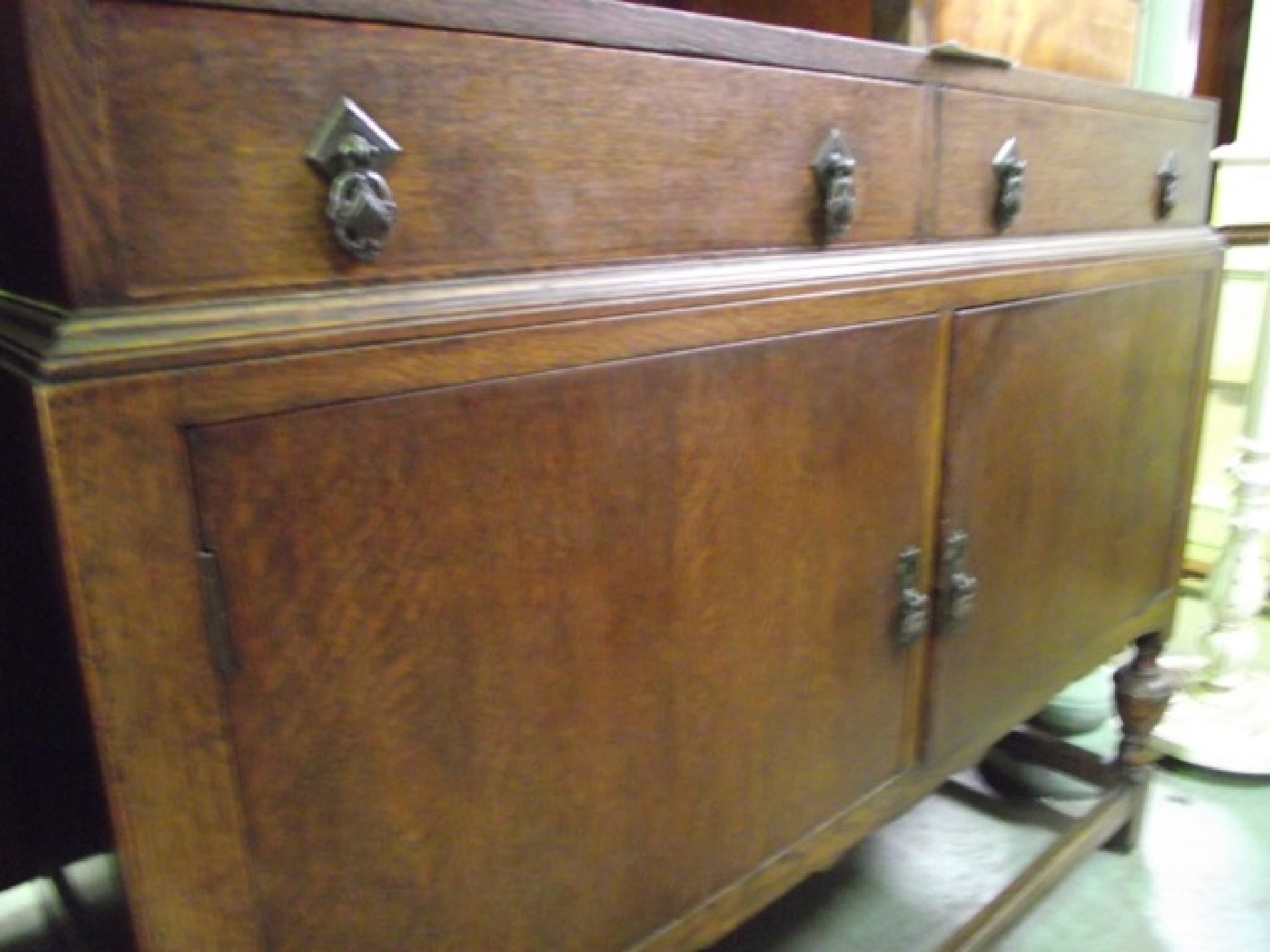 Appraisal: An early th century oak veneered sideboard of stepped form