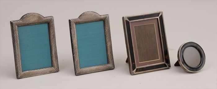 Appraisal: ENGLISH MONOGRAMMED SILVER TWO-FOLDED PICTURE FRAME A PAIR OF FRAMES