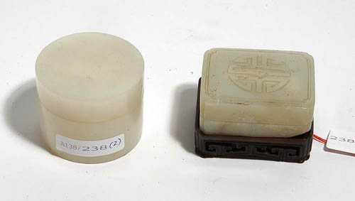 Appraisal: TWO SMALL JADE BOXES a cylindrical white jade D cm