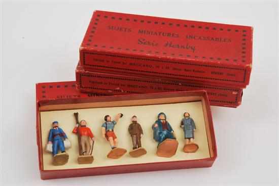 Appraisal: THREE FRENCH HORNBY SUJETS MINIATURES INCCASSABLES SETS COMPRISING NO SET