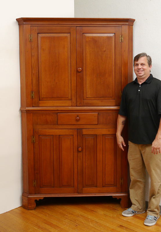 Appraisal: COUNTRY BLIND WALNUT CORNER CUPBOARD Pegged construction doors with shelves