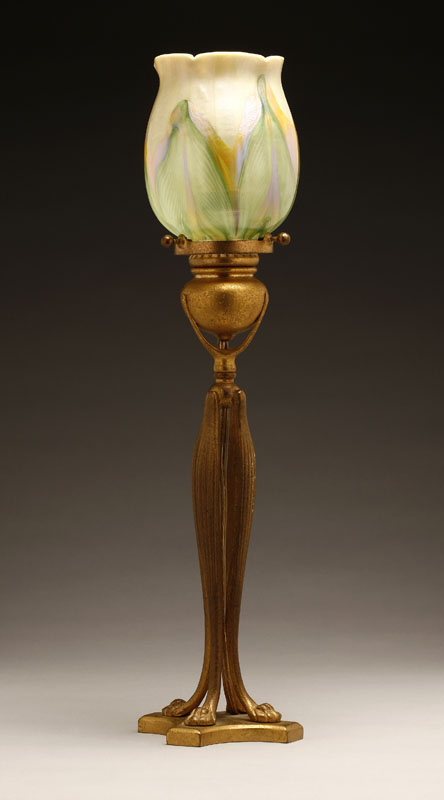 Appraisal: A Tiffany Studios gilt-bronze and art glass candlestick lamp A