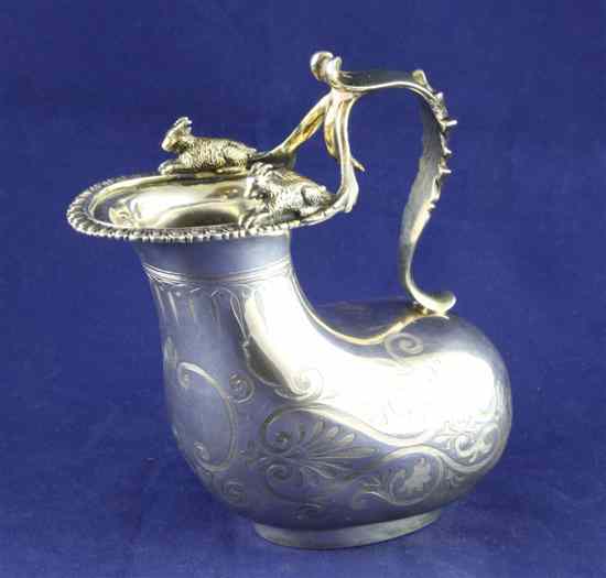 Appraisal: A Victorian silver cream jug of askos form by George