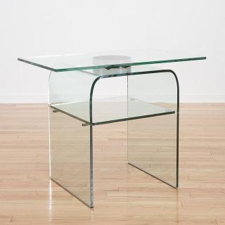 Appraisal: Fiam Italia bent glass side table Fiam Italia bent glass