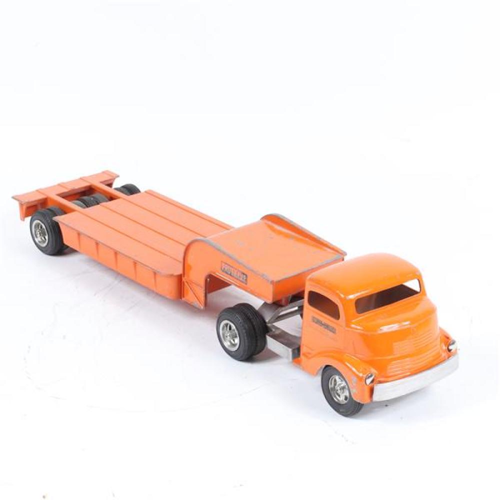 Appraisal: SMITH MILLER FRUEHAUE ORANGE PRESSED STEEL TOY TRUCK MACHINERY HAULER