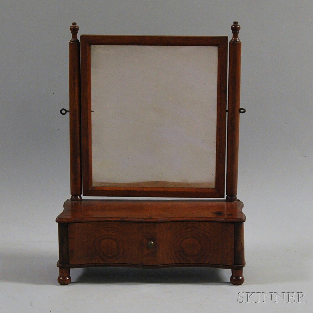 Appraisal: Walnut Shaving Mirror America th century the rectangular mirror and