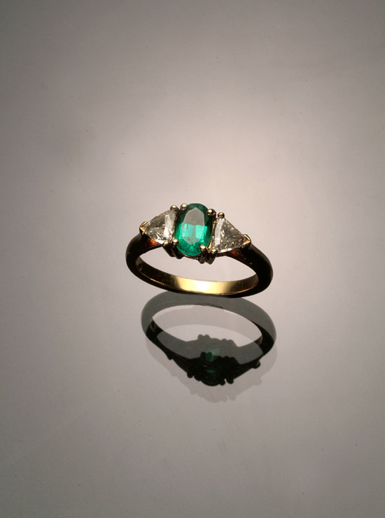 Appraisal: -Karat Yellow-Gold Emerald and Twin-Diamond Dinner Ring The four-prong A-box